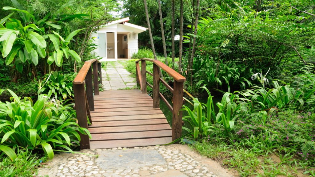 Beautiful house yard and wooden bridge